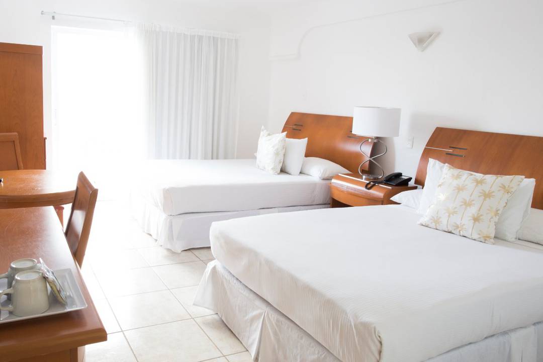 Deluxe oceanfront rooms with double beds Coral Princess Hotel & Dive Resort Cozumel Deluxe oceanfront rooms with double beds Coral Princess Hotel & Dive Resort Cozumel